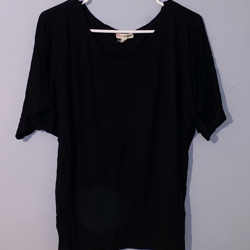 black shirt that is tight at bottom